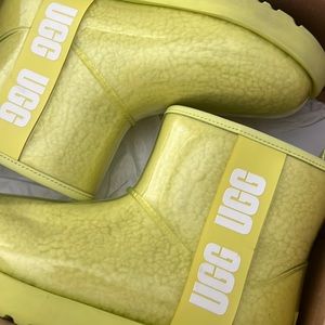 2 pairs of ugg rain boots in the size of 6Y.